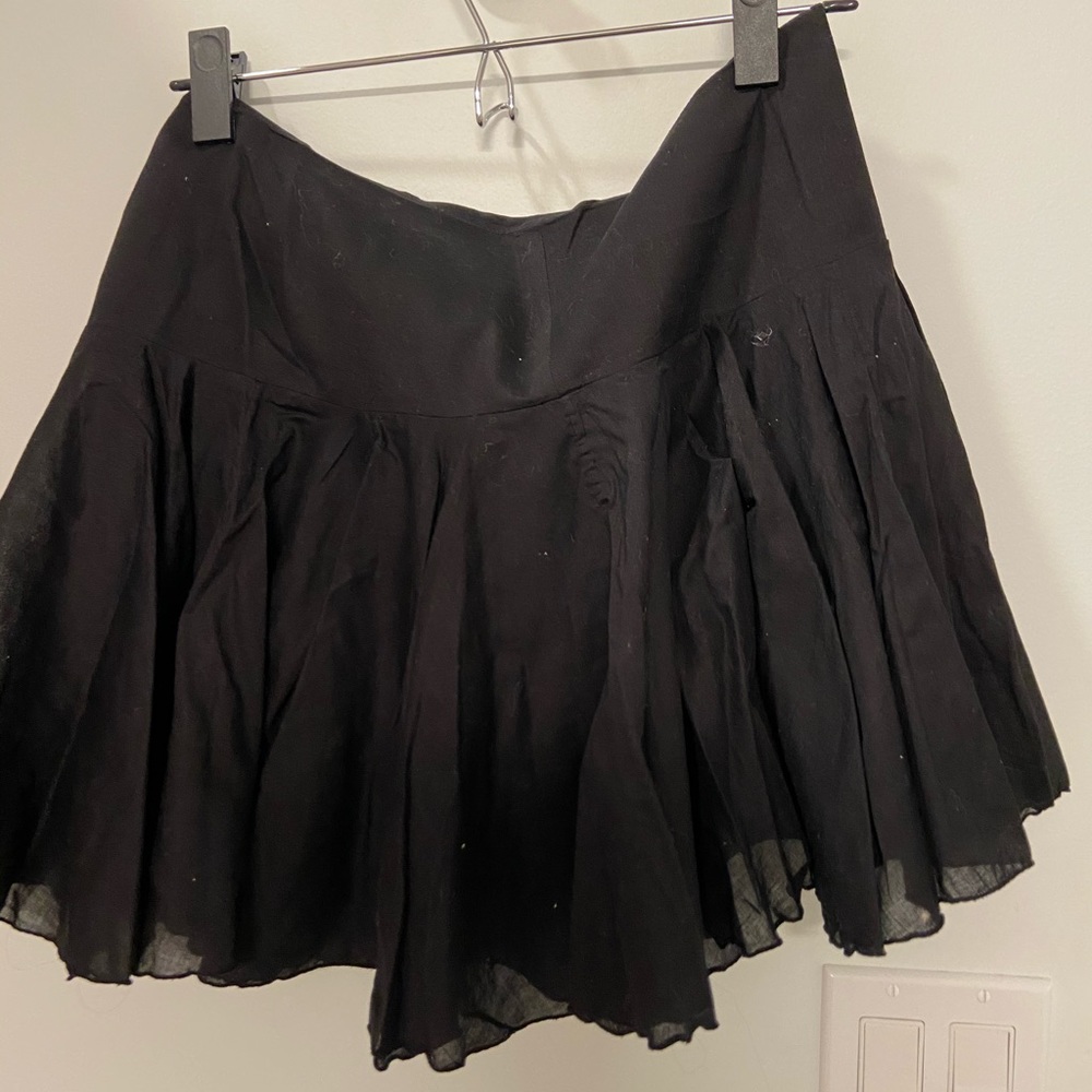 Hip hugger black flare skirt